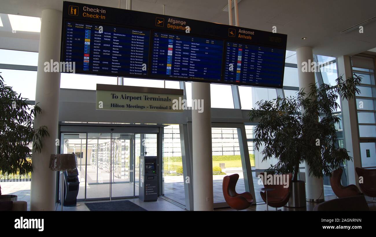 COPENHAGEN, DENMARK - JUL 04th, 2015: Flights information board at an airport hotel near the terminal Stock Photo