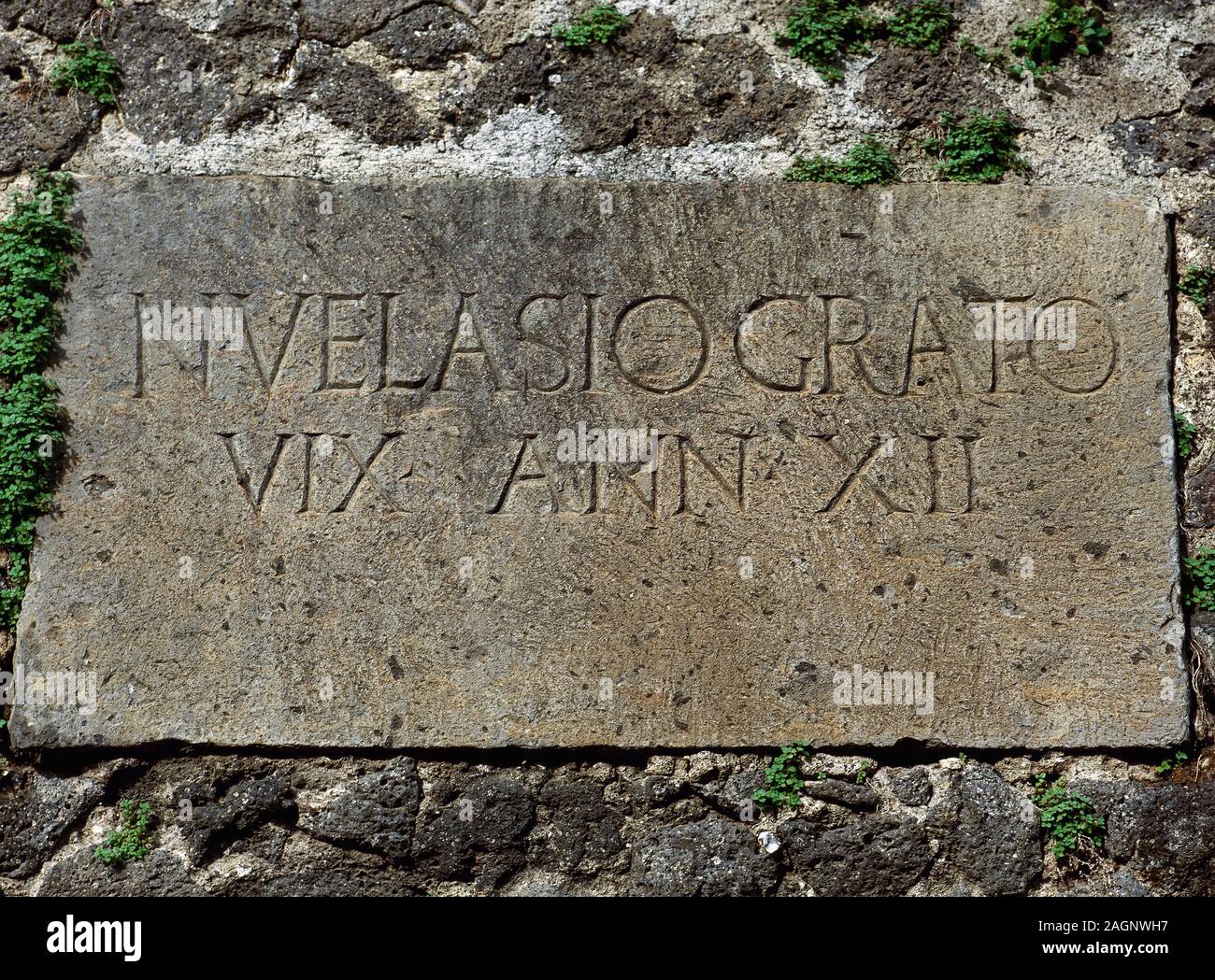 Mortuary plaque with  inscription in Roman capital letters. Via de los Sepulcros. Pompeii, Italy. Stock Photo