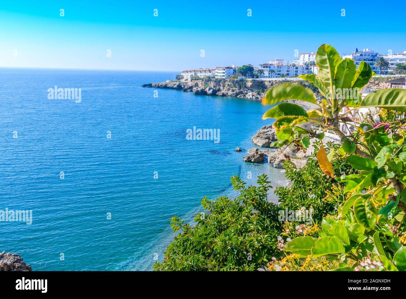Viewpoint from the balcony Europe on the Spanish coast of Nerja. Sunshine on an autumn day on the Costa del Sol. View of the Mediterranean Sea with bl Stock Photo