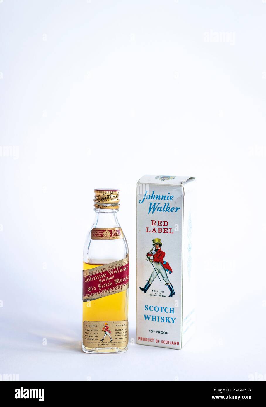 1960s 1970s Johnnie Walker Red Label scotch whisky miniature bottle and  packaging box Stock Photo - Alamy