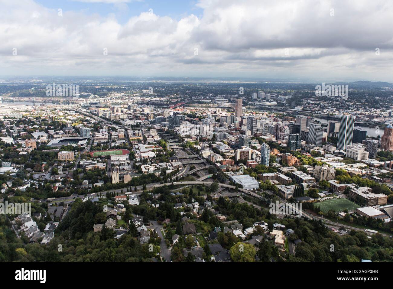 Aerial view of the buildings, homes, streets and bridges near downtown Portland, Oregon, USA. Stock Photo