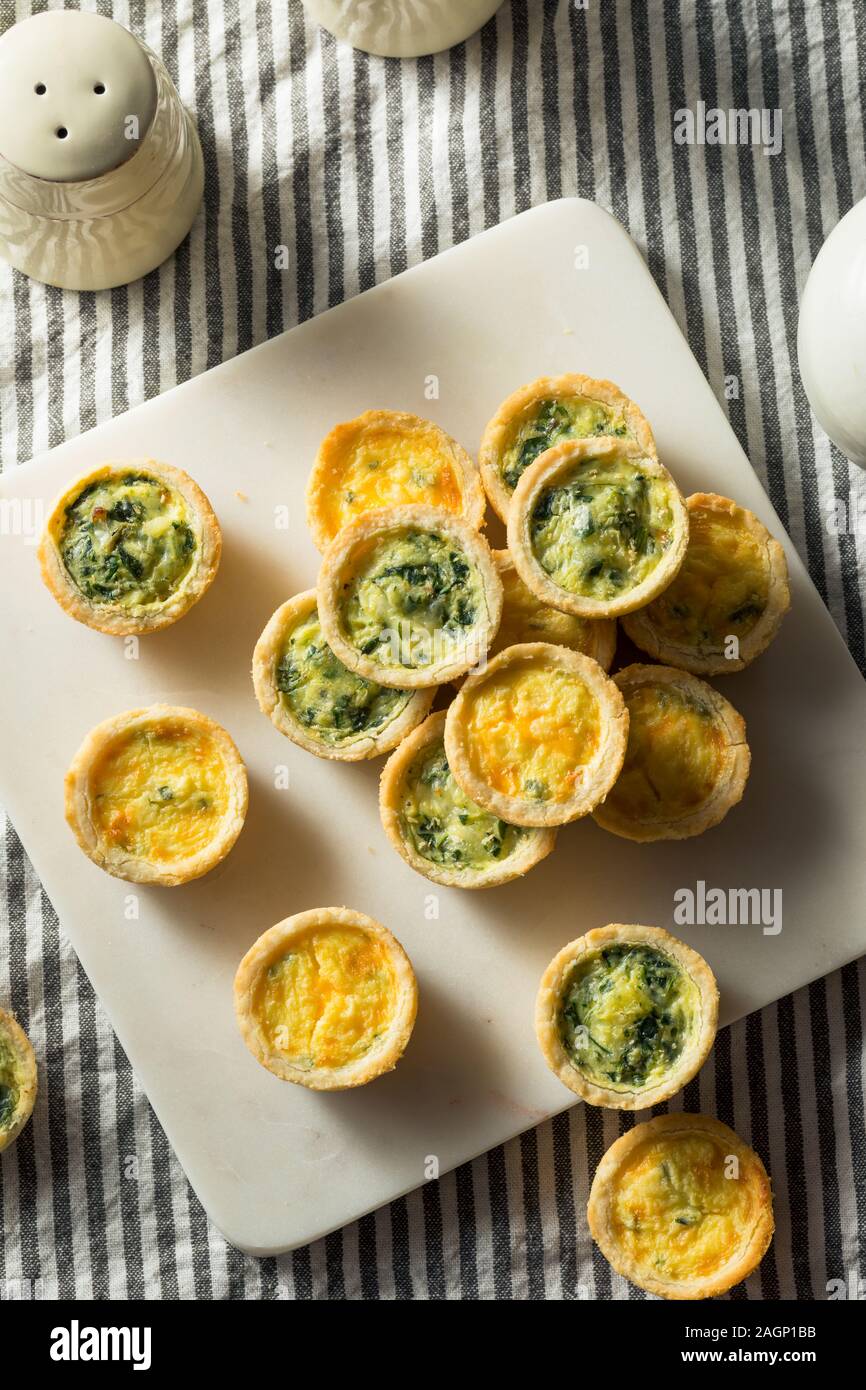 Homemade Mini Egg Quiches with Spinach and Feta Stock Photo Alamy