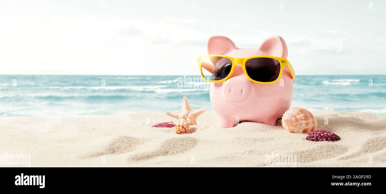 Piggy bank resting on vacation. Saving money, travel concept Stock Photo