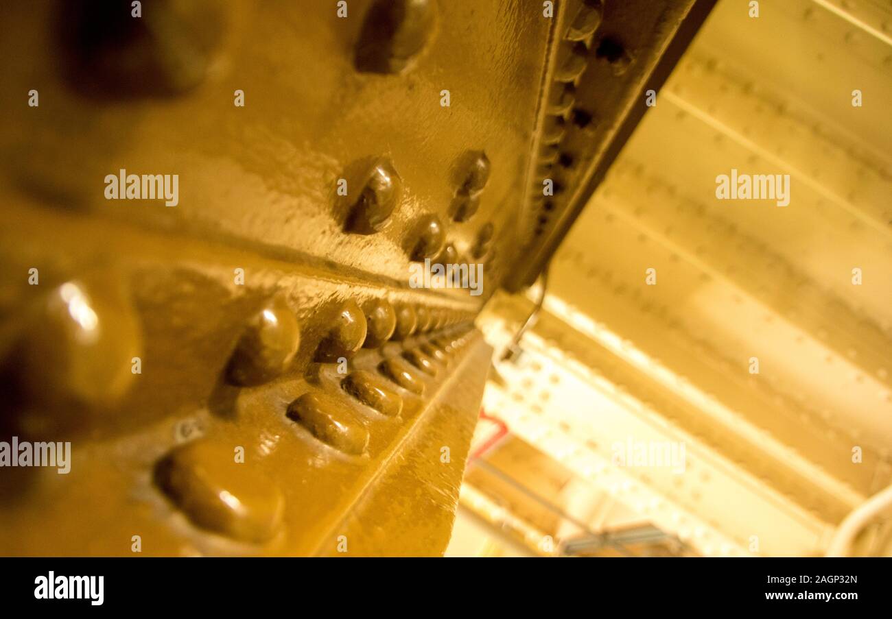 August 21, 2019 – Tower Bridge, London, United Kingdom. The view along one of the steel beams from inside the world famous Tower Bridge in London. Stock Photo