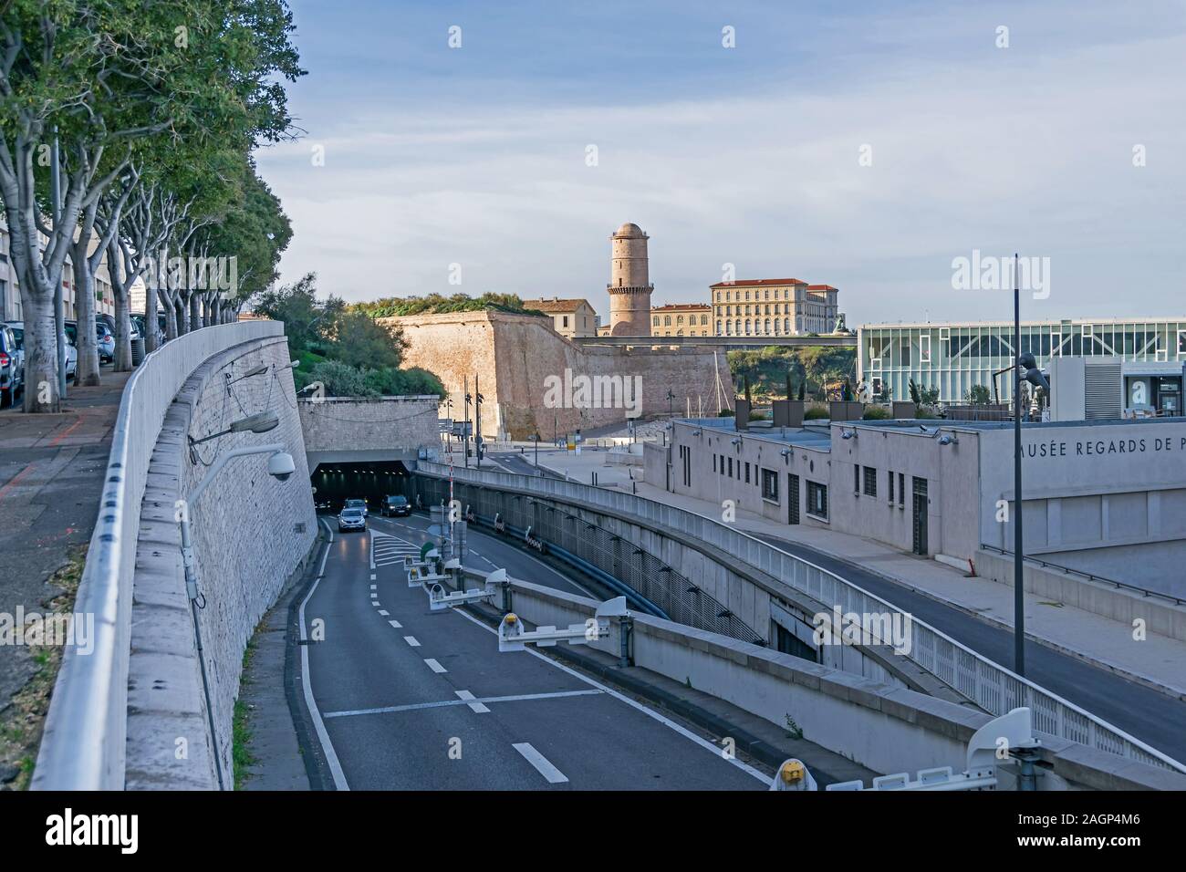 Marseille, France - November 1, 2019: View at the car road Esplanade de la Tourette, Fort Saint-Jean at the entrance to the Old Port and Avenue Vaudoy Stock Photo