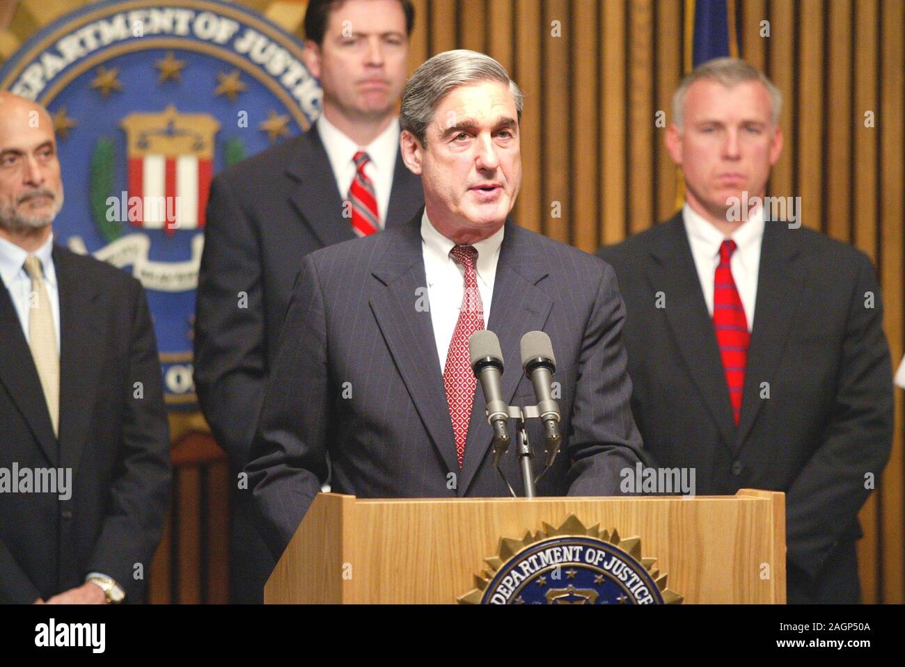 Robert Mueller, FBI Director. The Federal Bureau of Investigation (FBI) is the domestic intelligence and security service of the United States and its principal federal law enforcement agency. Operating under the jurisdiction of the United States Department of Justice, the FBI is also a member of the U.S. Intelligence Community and reports to both the Attorney General and the Director of National Intelligence. A leading U.S. counter-terrorism, counterintelligence, and criminal investigative organization, the FBI has jurisdiction over violations of more than 200 categories of federal crimes. Stock Photo