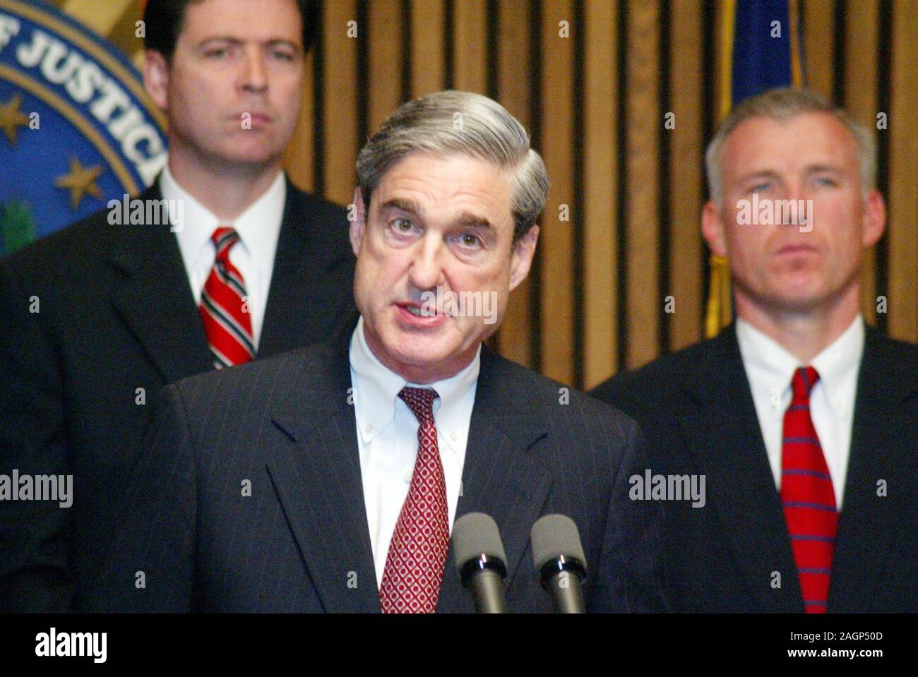 Robert Mueller, FBI Director. The Federal Bureau of Investigation (FBI) is the domestic intelligence and security service of the United States and its principal federal law enforcement agency. Operating under the jurisdiction of the United States Department of Justice, the FBI is also a member of the U.S. Intelligence Community and reports to both the Attorney General and the Director of National Intelligence. A leading U.S. counter-terrorism, counterintelligence, and criminal investigative organization, the FBI has jurisdiction over violations of more than 200 categories of federal crimes. Stock Photo