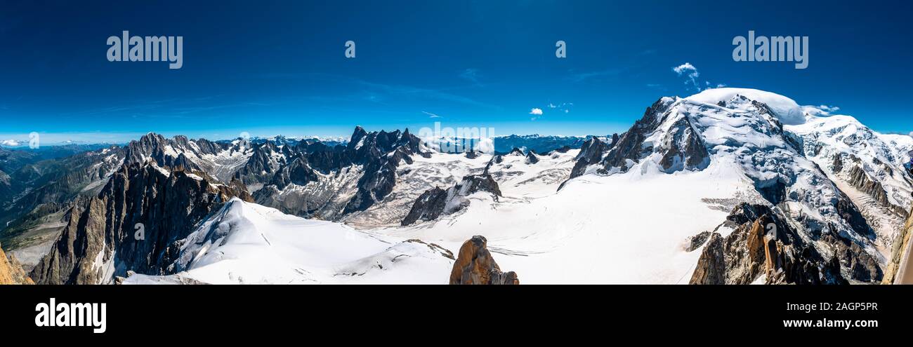 Mont Blanc, the roof of Europe with its 4808 meters above sea level, is a collection of peaks. Overlooking the sea of ice the Grandes Jorasses, the Stock Photo