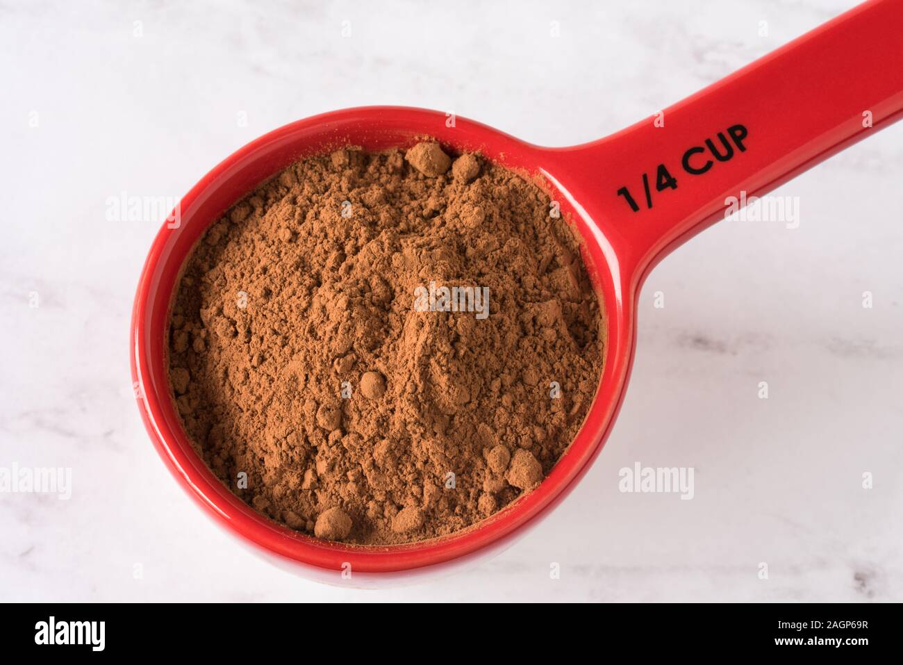 Cocoa Powder in a Measuring Cup Stock Photo - Alamy