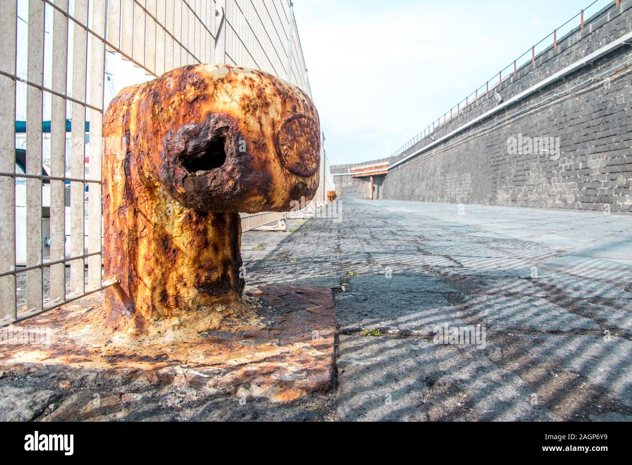 One of many harbor wall anchors used to tie ships to the harbor wall