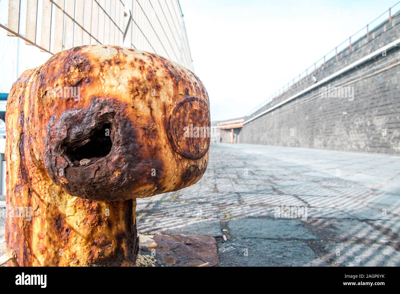 One of many harbor wall anchors used to tie ships to the harbor wall