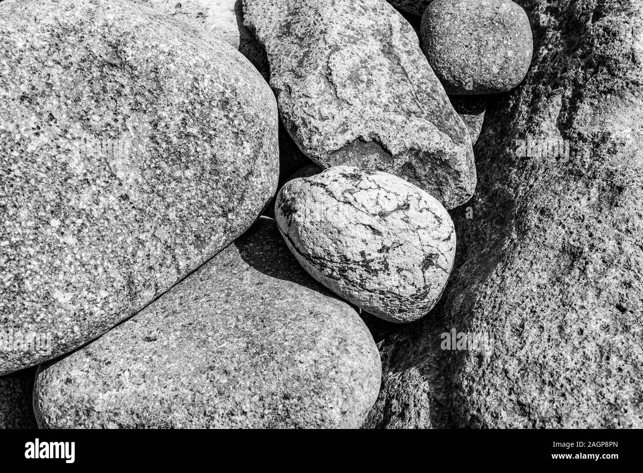Rocks and stones in various sizes, shapes, and textures photographed in Sengamnon beach, Japan Stock Photo