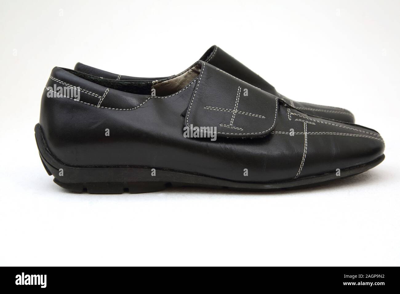 A Pair of Argentinian Black Leather Shoes with Velcro Fastening Stock Photo