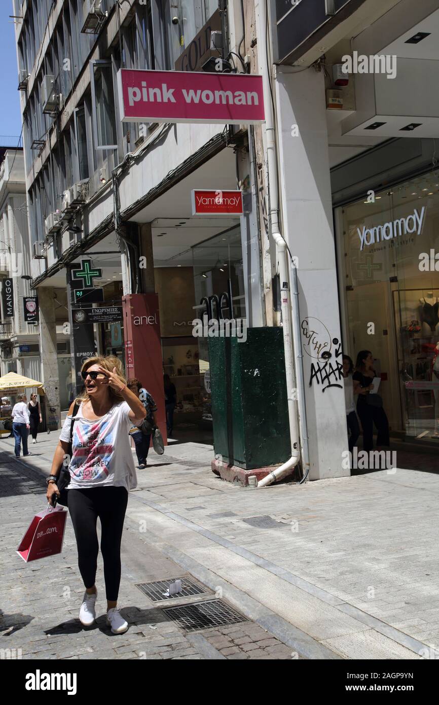 Athens Greece Ermou Street People Shopping - Woman wearing T-shirt with  Union Jack and Slogan "Bloody Hell we're Buggered Now Stock Photo - Alamy