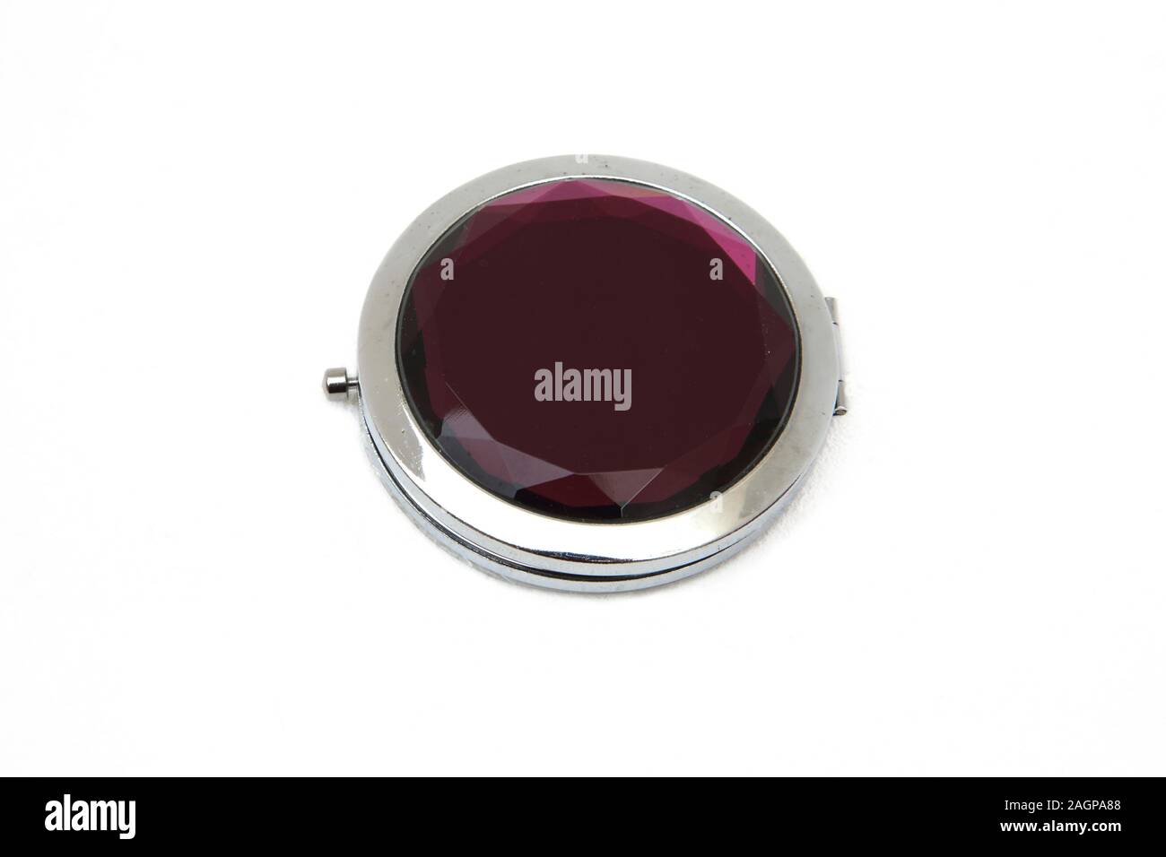 Magnifying Compact Mirror with Purple Plastic Detail Stock Photo