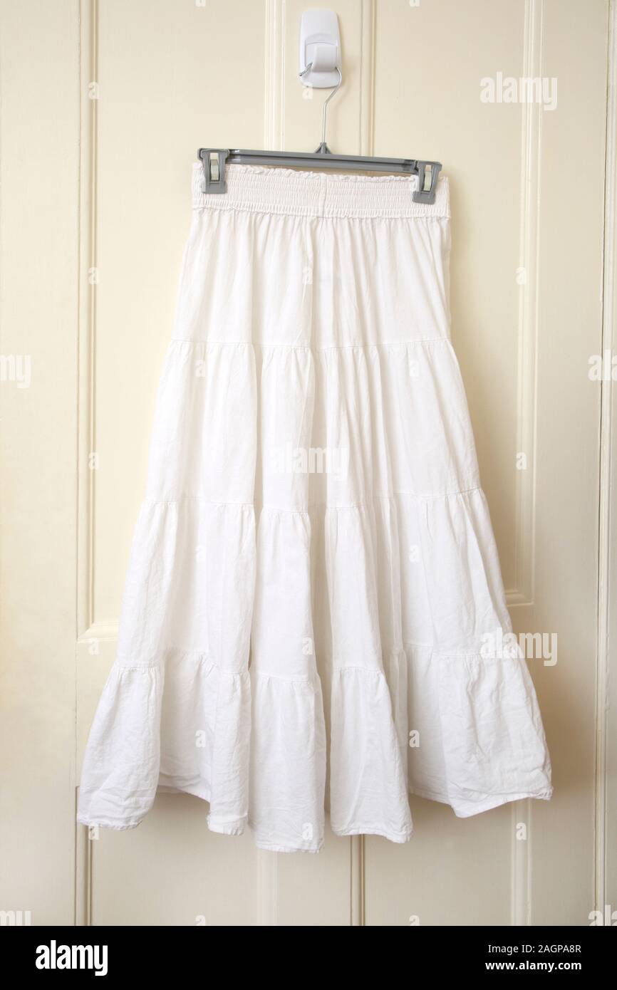 Long White Cotton Skirt with Wide Elastic Waistband Stock Photo
