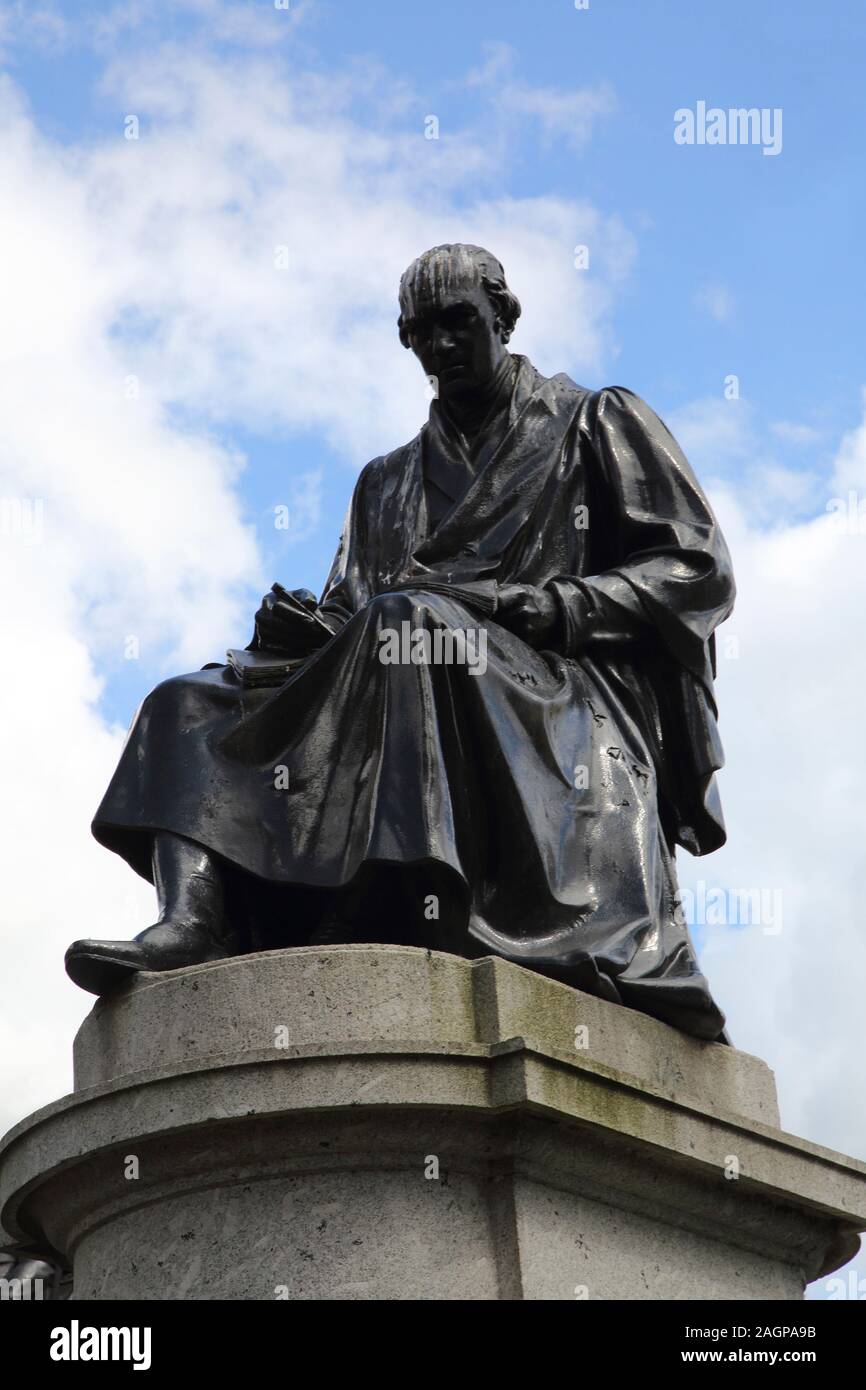 Glasgow Scotland George Square Bronze Statue of James Watt 1736 - 1819 inventor, mechanical engineer and chemist famous for inventing the Watt Steam E Stock Photo