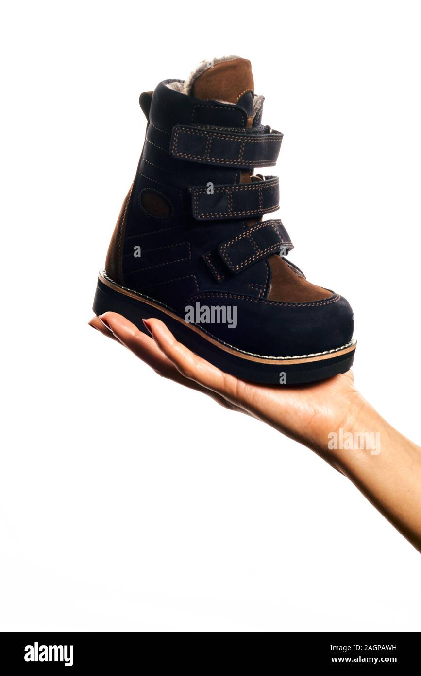 Orthopedic footwear. Winter footwear. Orthopedic baby shoes Stock Photo