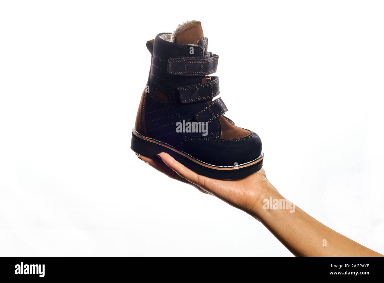 Orthopedic footwear. Winter footwear. Orthopedic baby shoes Stock Photo