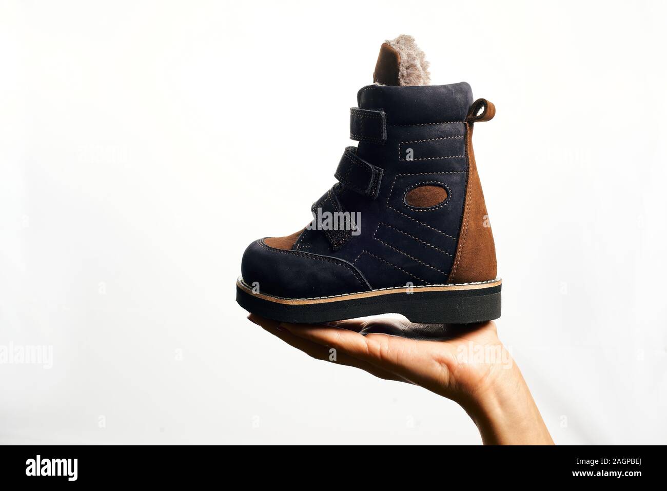 Orthopedic footwear. Winter footwear. Orthopedic baby shoes Stock Photo