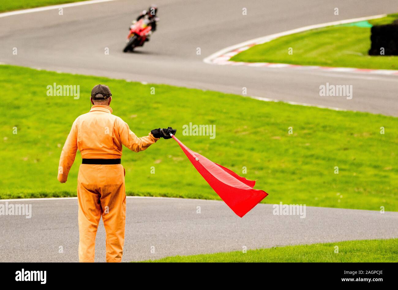 Red Flag Racetrack Marshal waving red flag hi-res stock photography and images - Alamy