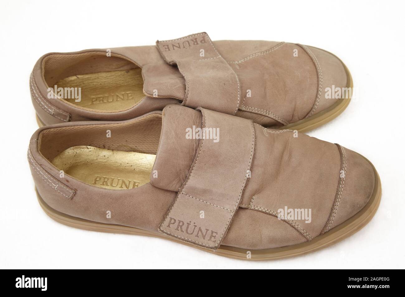 A pair of Beige Suede Prune Shoes Stock Photo