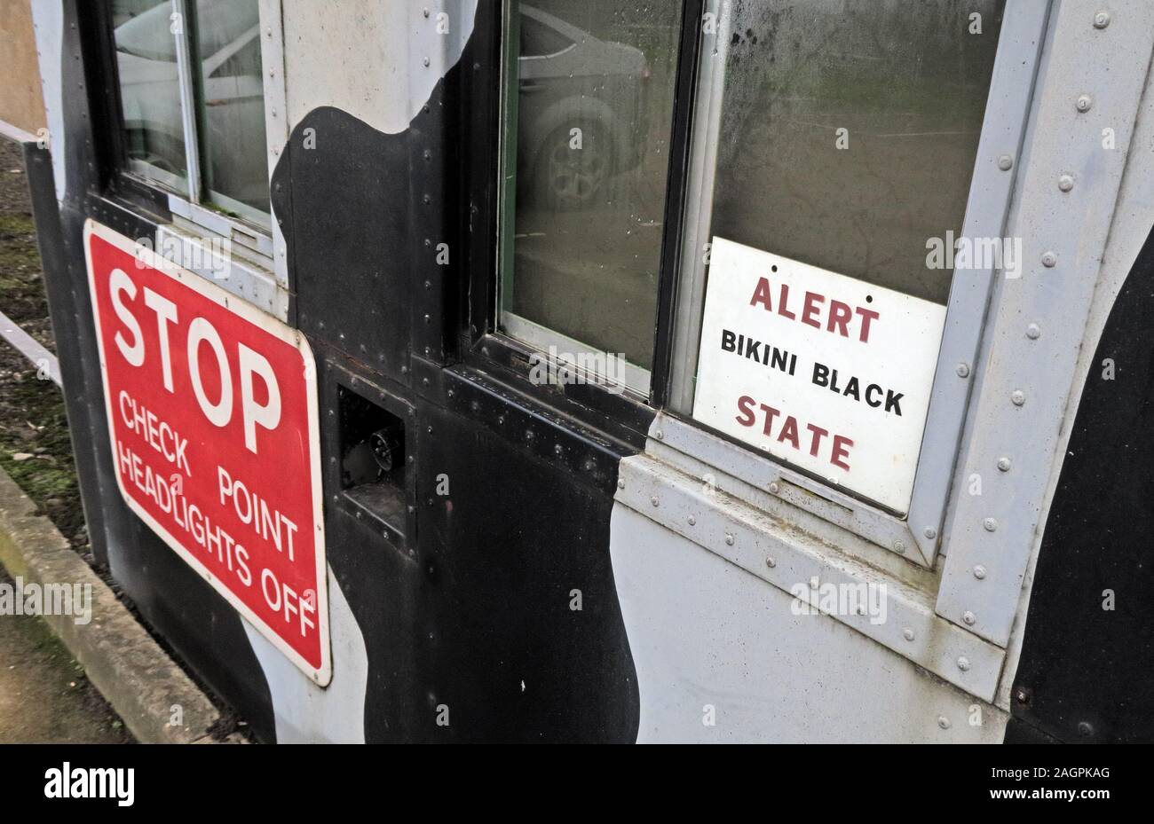 MOD Ministry Of Defence STOP Check Point Headlights off - sign Alert State Bikini Black Stock Photo