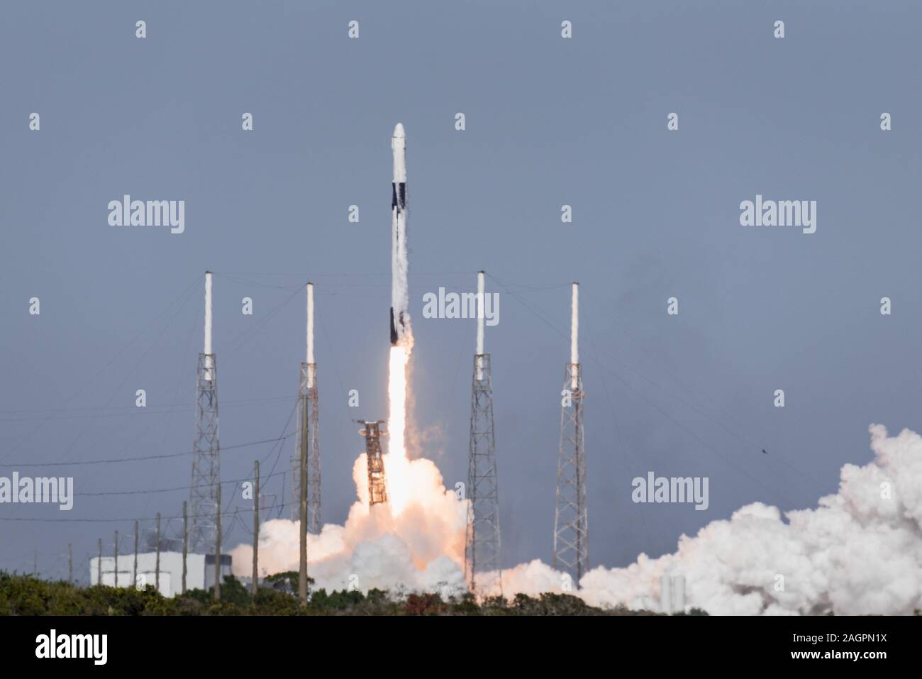 A SpaceX Falcon 9 CRS-19 rocket launched at Cape Canaveral Air Force Station, Florida, Dec. 5, 2019. The CRS-19 is the latest mission in the Commercial Resupply Services program which transports thousands of pounds of cargo and supplies to resupply the International Space Station. (U.S. Air Force photo by Joshua Clifford) Stock Photo