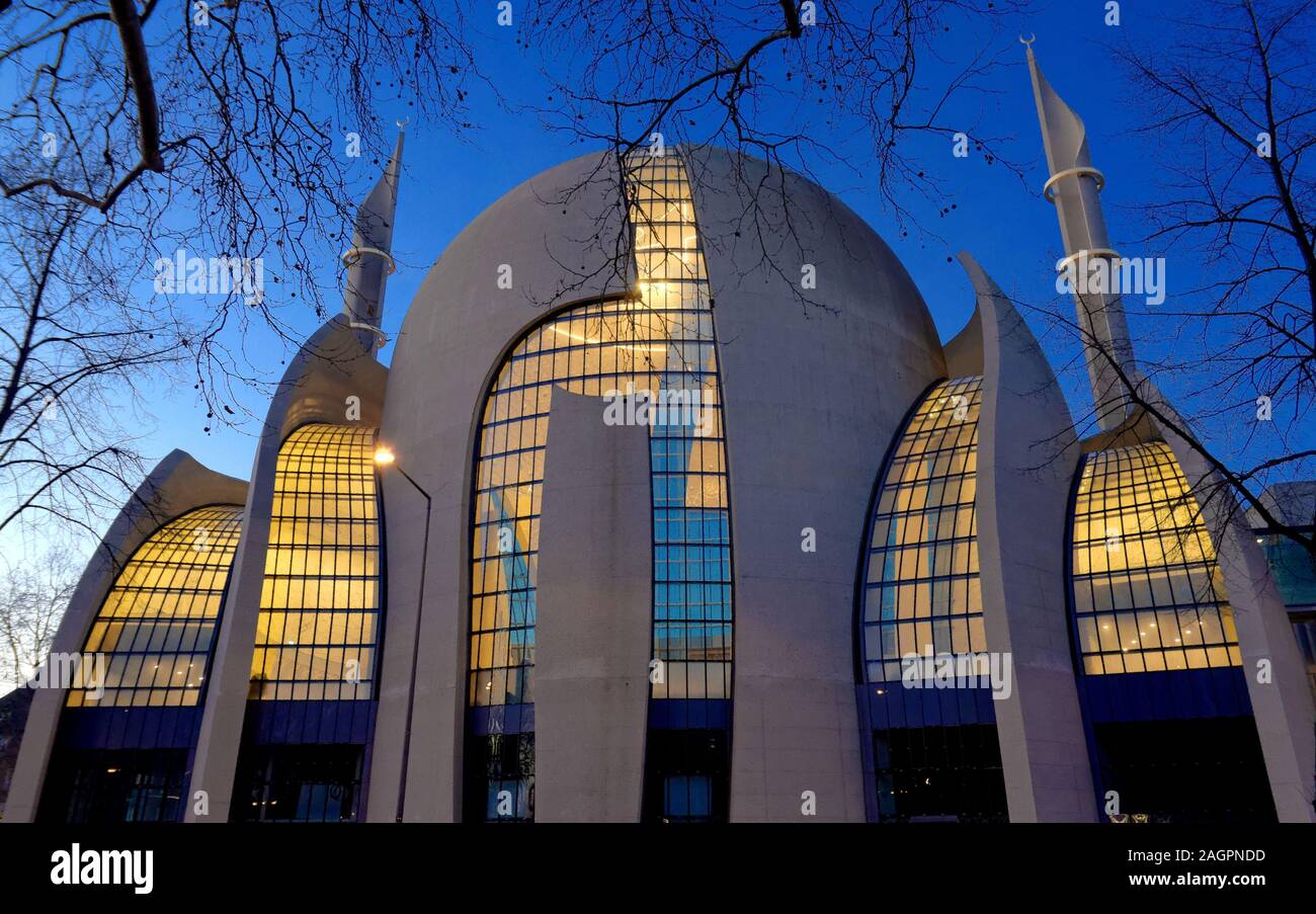 the illuminated cologne central mosque at dusk Stock Photo