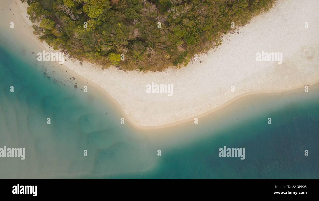Aerial drone view of Coast as a background from top view Tree sand Beach Ocean Stock Photo