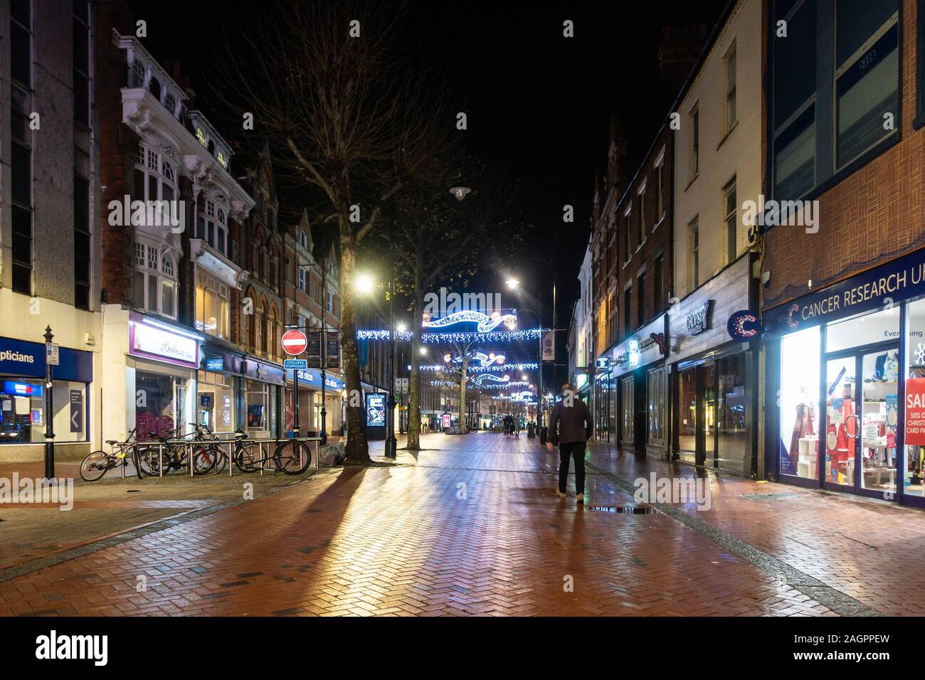 Christmas lights hang across Broad Street in Reading, Berkshire at