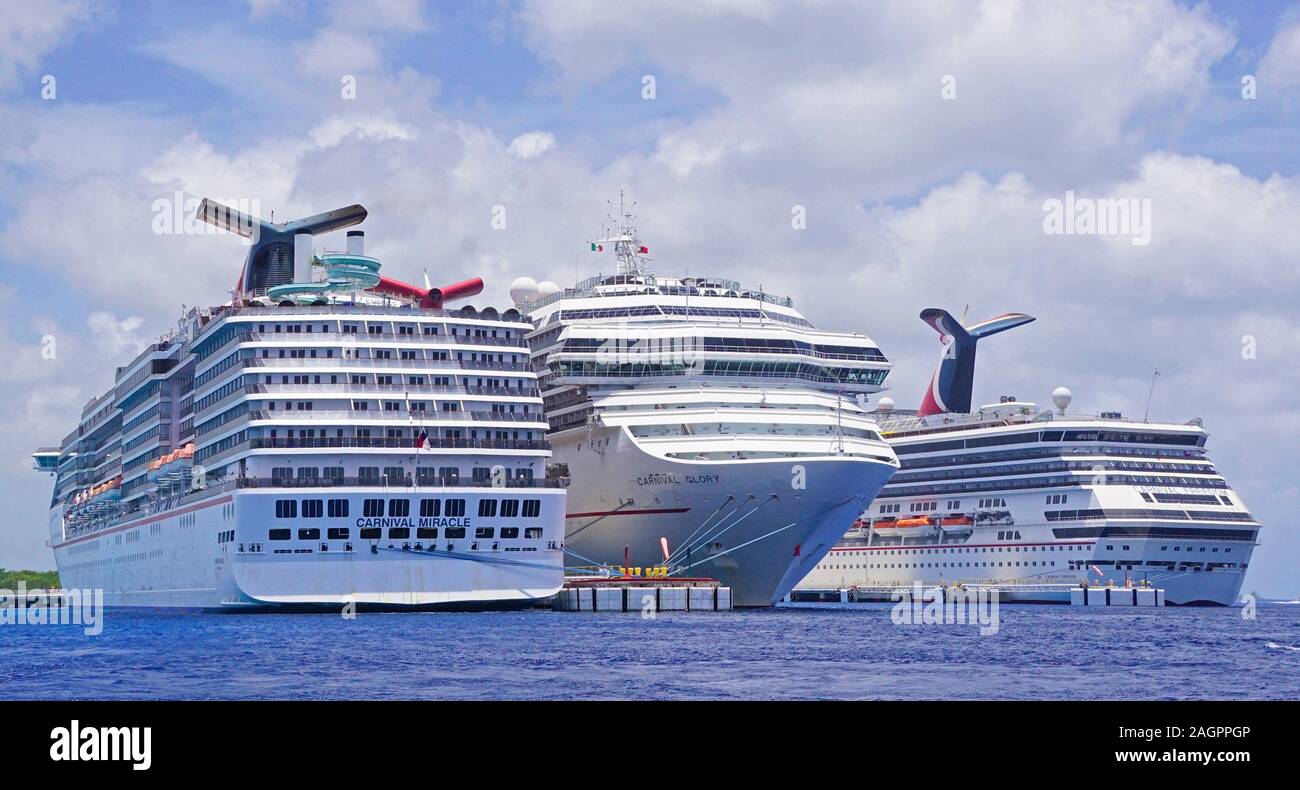 Trio of Carnival Cruise Line ships at Cozumel, Mexico. Stock Photo