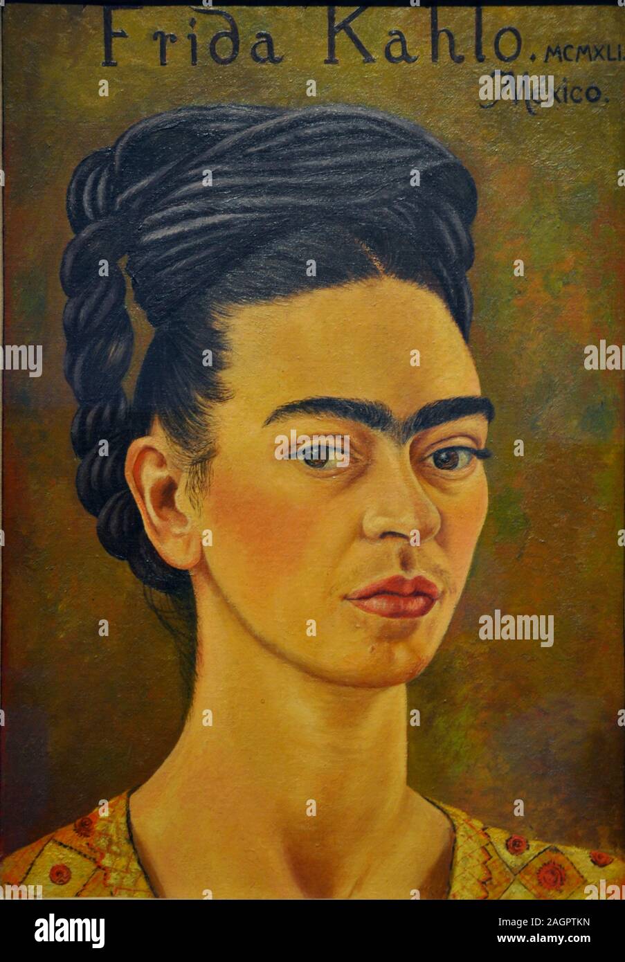 Autorretrato con vestido rojo y dorado (Self-Portrait in Red and Gold Dress).  Museum: La Coleccin de Arte Mexicano Moderno y Contemporneo de Jacques y  Natasha Gelman. Author: FRIDA KAHLO Stock Photo -