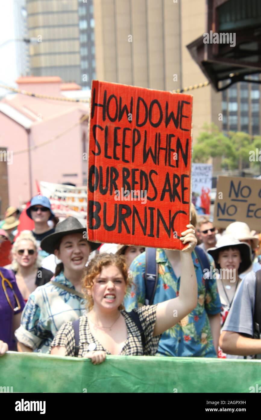 Sydney, Australia. 21st December 2019. Climate change protesters gathered at First Fleet Park and listened to various speakers before marching across the Sydney Harbour Bridge to the Prime Ministers official residence at Kirribilli House. Credit: Richard Milnes/Alamy Live News Stock Photo