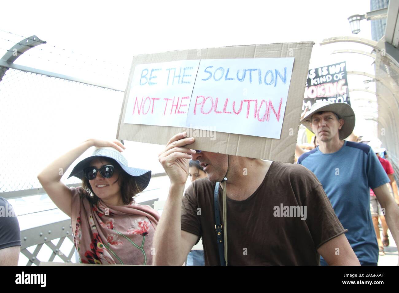 Sydney, Australia. 21st December 2019. Climate change protesters gathered at First Fleet Park and listened to various speakers before marching across the Sydney Harbour Bridge to the Prime Ministers official residence at Kirribilli House. Credit: Richard Milnes/Alamy Live News Stock Photo