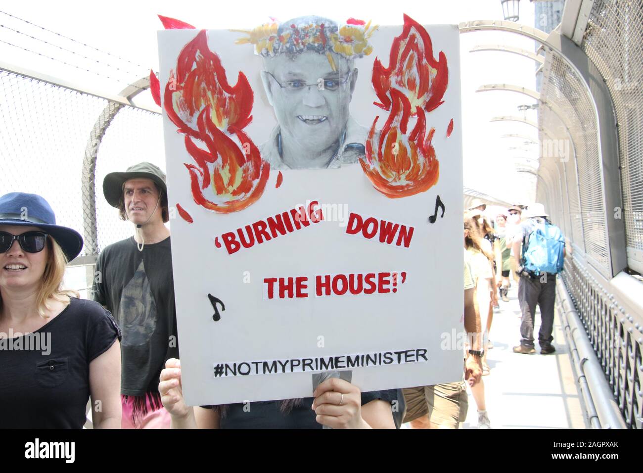 Sydney, Australia. 21st December 2019. Climate change protesters gathered at First Fleet Park and listened to various speakers before marching across the Sydney Harbour Bridge to the Prime Ministers official residence at Kirribilli House. Credit: Richard Milnes/Alamy Live News Stock Photo