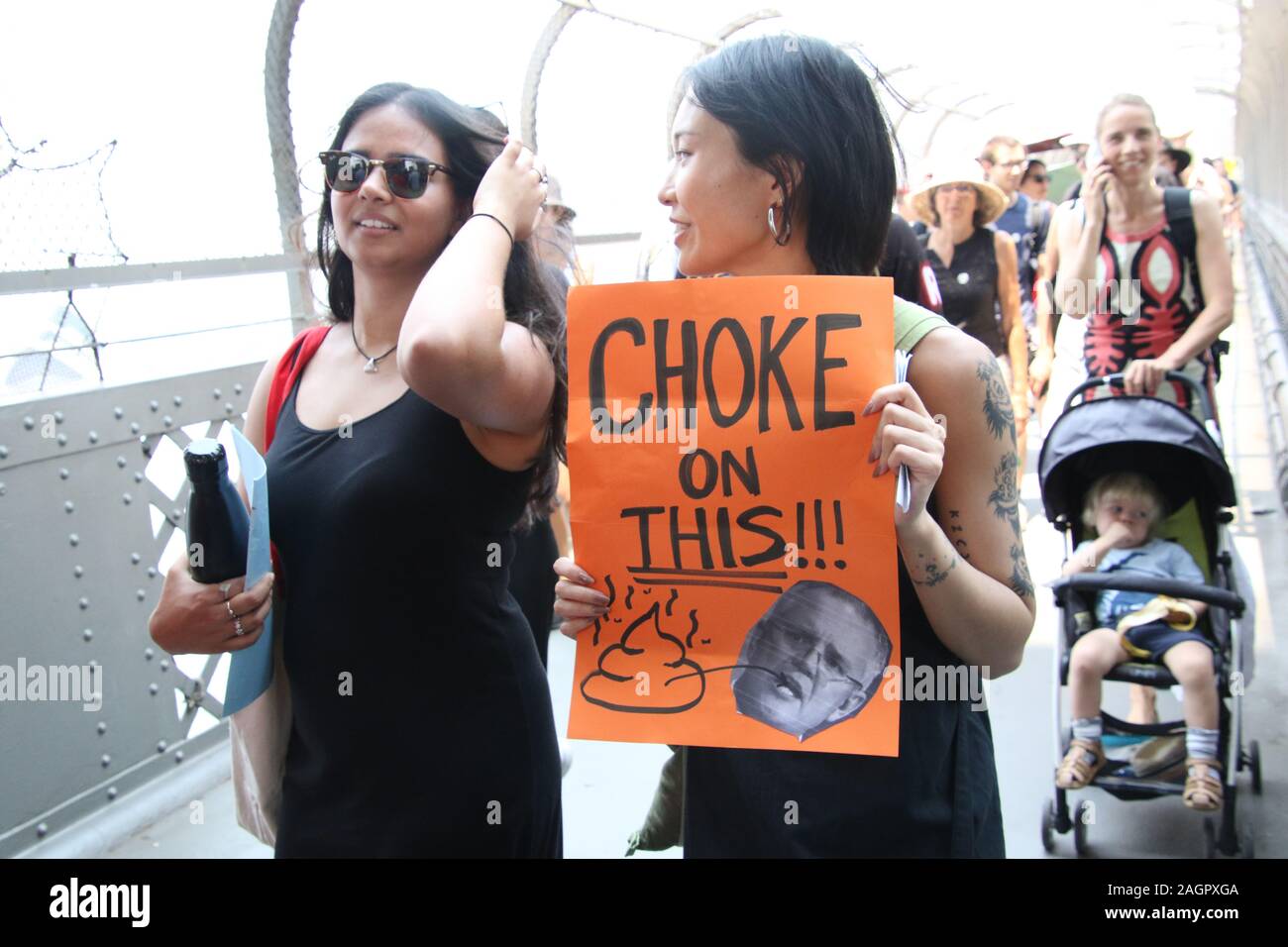 Sydney, Australia. 21st December 2019. Climate change protesters gathered at First Fleet Park and listened to various speakers before marching across the Sydney Harbour Bridge to the Prime Ministers official residence at Kirribilli House. Credit: Richard Milnes/Alamy Live News Stock Photo