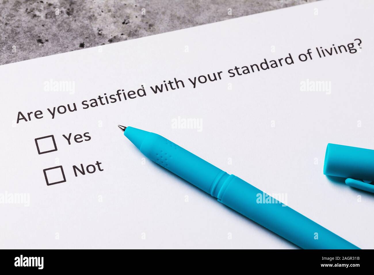 Pen and sheet with text: You are happy with your standard of living. Concept on the topic of anonymous information collection Stock Photo
