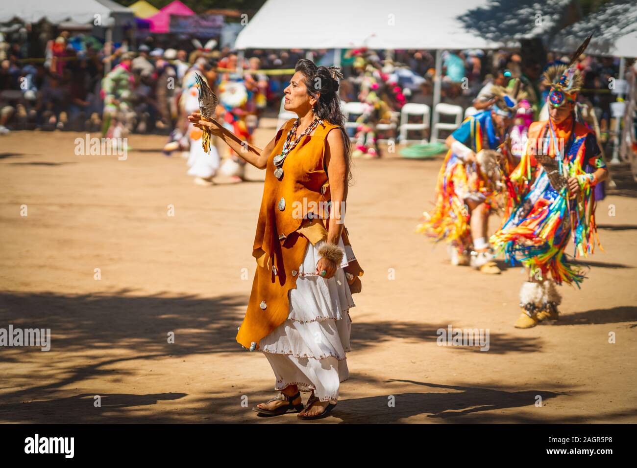 2019 Powwow, woman dance. Native American Woman in Full Regalia. Stock Photo