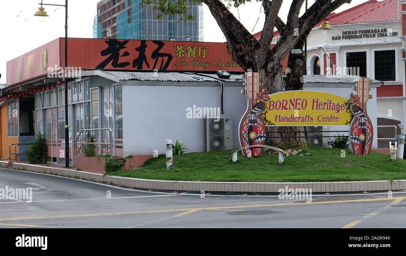 Miri, Malaysia - November 16, 2019: Street in Miri, with a large signboard written 'Borneo Heritage Handcrafts Centre'. Stock Photo