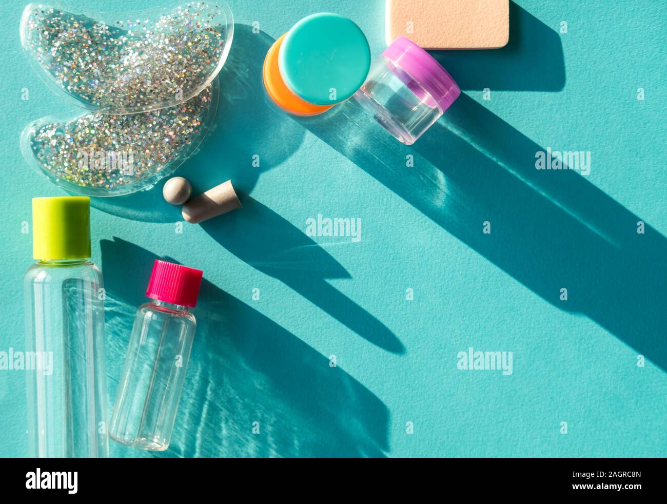 Travel size cosmetic and creams containers set Stock Photo Alamy