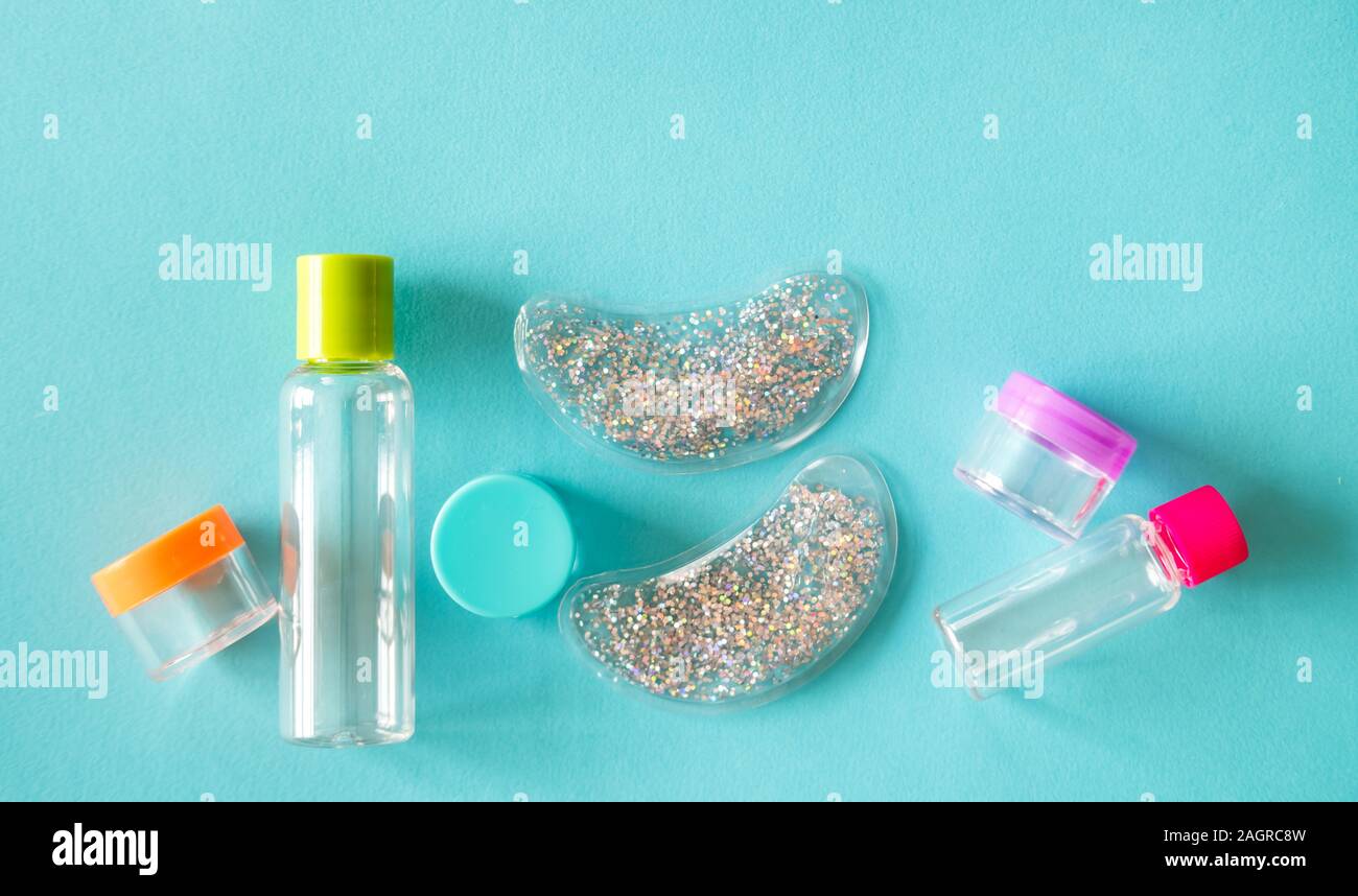 Travel size cosmetic and creams containers set Stock Photo Alamy
