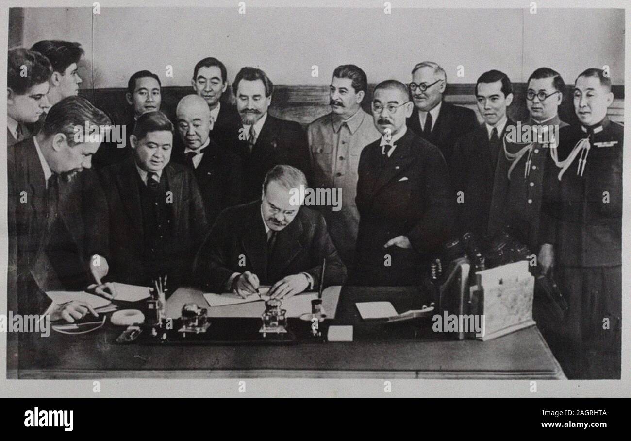 Vyacheslav Molotov signing the Soviet-Japanese Neutrality Pact on 13 April 1941. Museum: PRIVATE COLLECTION. Author: ANONYMOUS. Stock Photo