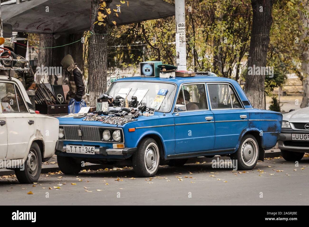 TBILISI, November 23, 2019. Different items placed on old style Soviet cars and sold at