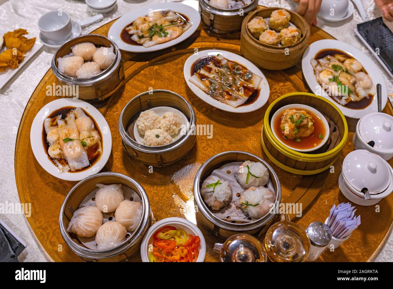Hong Kong steamed dumplings and rice rolls in dimsum restaurant Stock