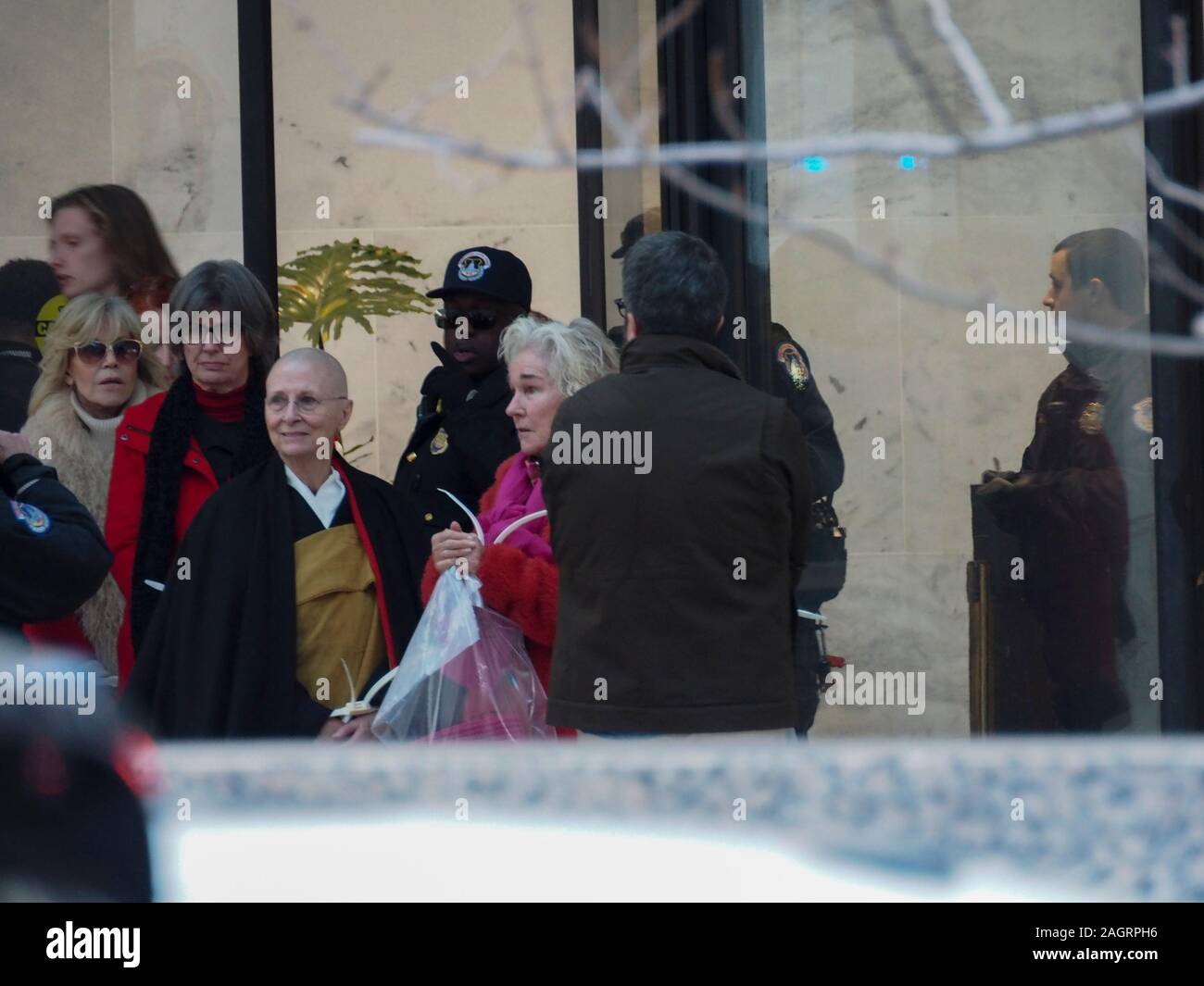 December 20, 2019, Washington, District of Columbia, USA: Jane Fonda being led to United Capitol Police van after being arrested for civil disobedience in the Hart Office building during sit-in for Fire Drill Fridays, which calls attention to the need to take action to address the changing climate. (Credit Image: © Sue Dorfman/ZUMA Wire) Stock Photo