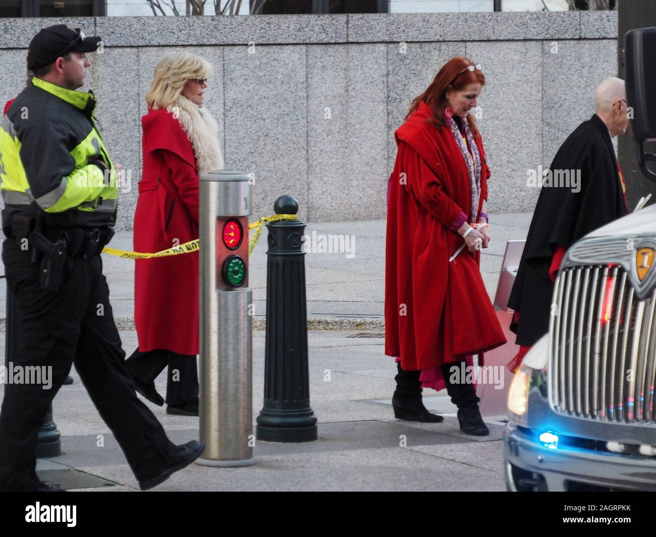 Washington, District of Columbia, USA. 20th Dec, 2019. Jane Fonda being led to United Capitol Police van after being arrested for civil disobedience in the Hart Office building during sit-in for Fire Drill Fridays, which calls attention to the need to take action to address the changing climate. Credit: Sue Dorfman/ZUMA Wire/Alamy Live News Stock Photo