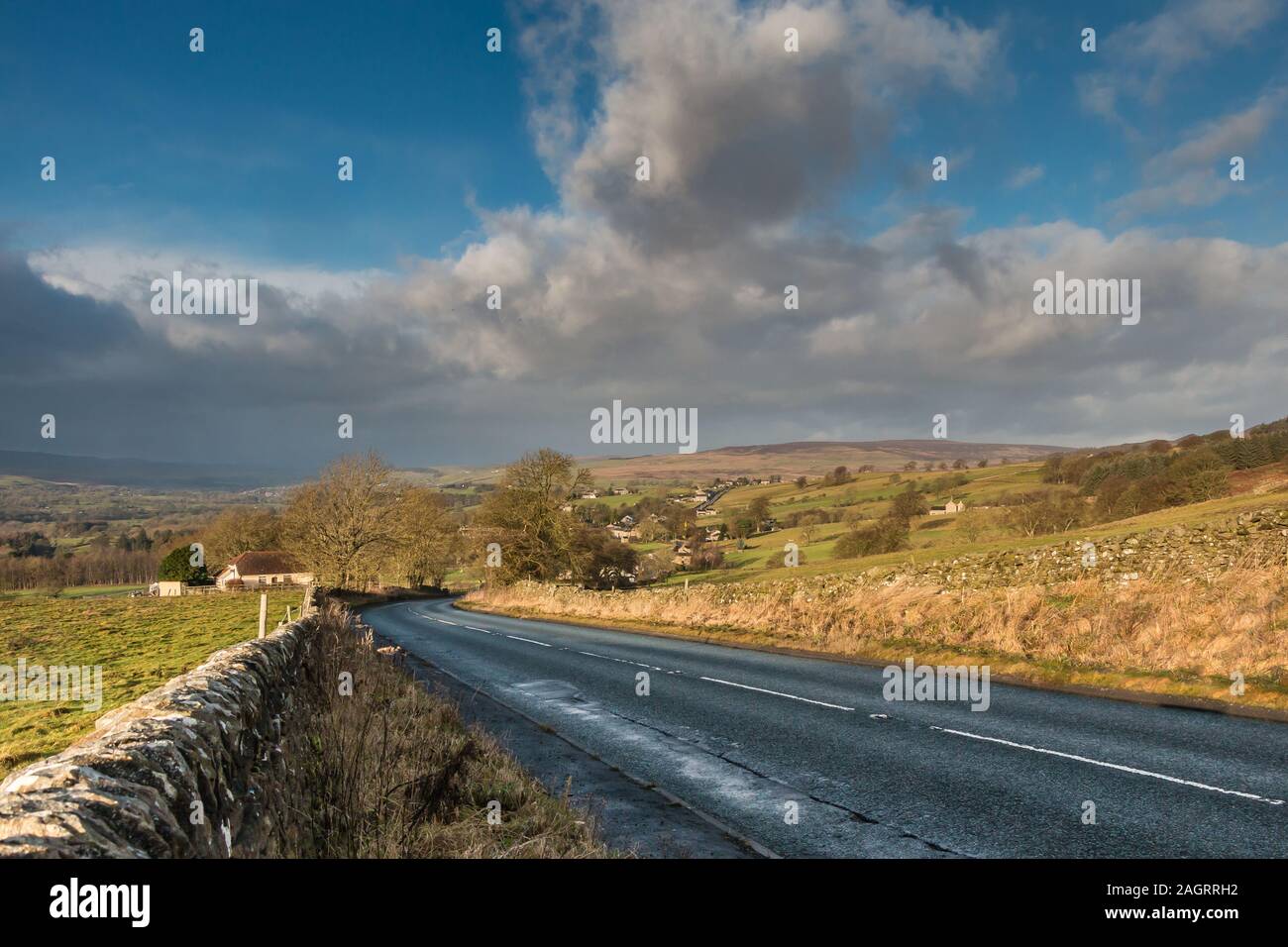 The village of Eggleston, Teesdale from Folly Top under a big sky after Storm Atiyah 8 December 2019 Stock Photo