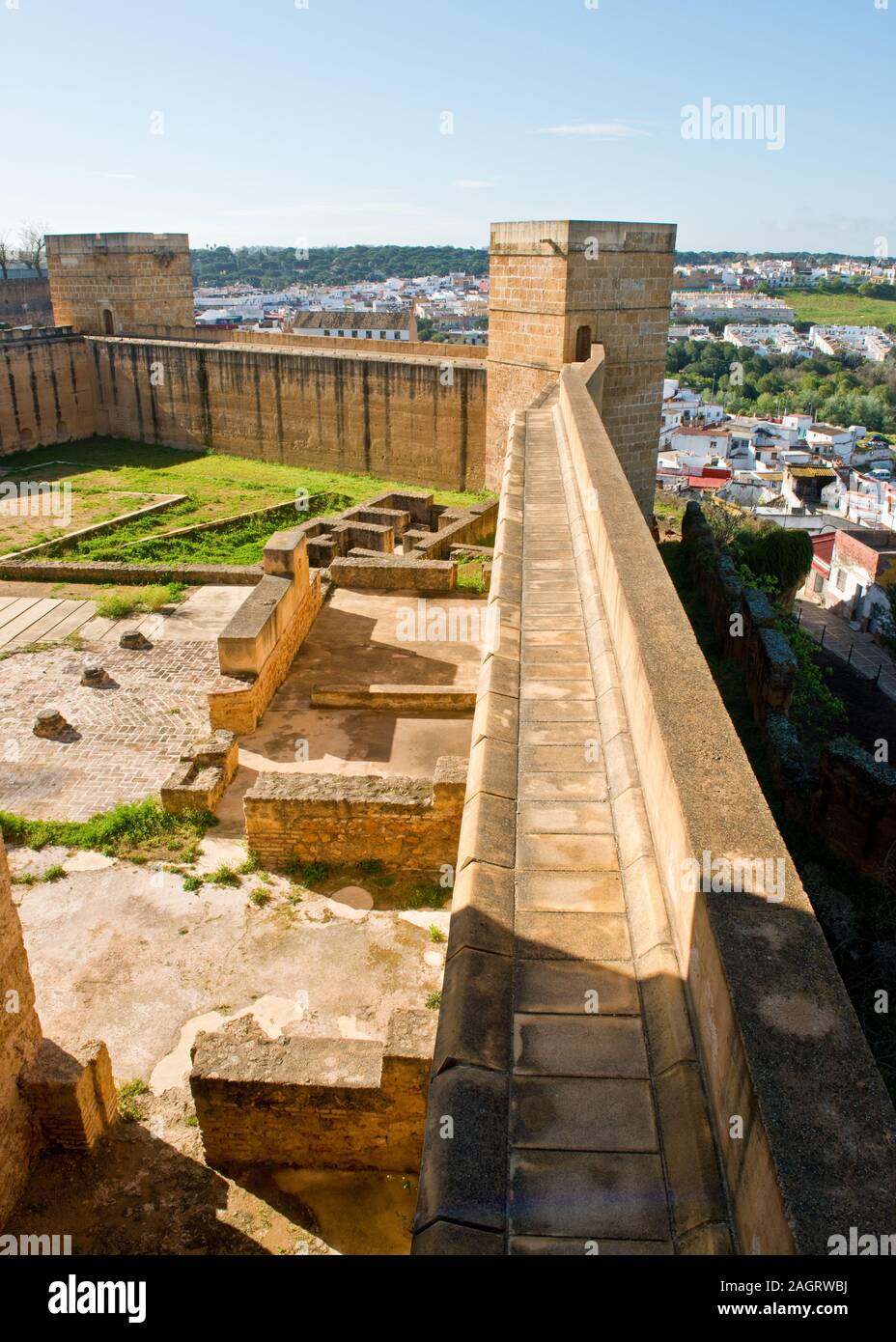 Castle hexagonal tower at corner of curtain wall. Castillo de Alcalá de Guadaíra. Castle fortress. Andalusia, Southern Spain, Europe Stock Photo