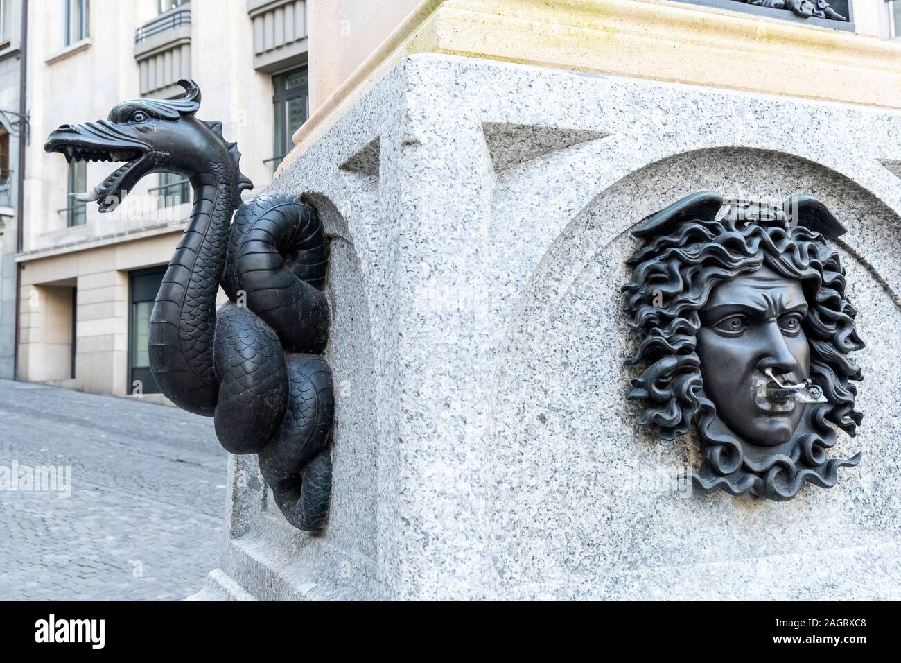 GENEVA, SWITZERLAND - december 17, 2019: The fountain called Escalade  is formed by a granite basin of Mont Blanc. Stock Photo